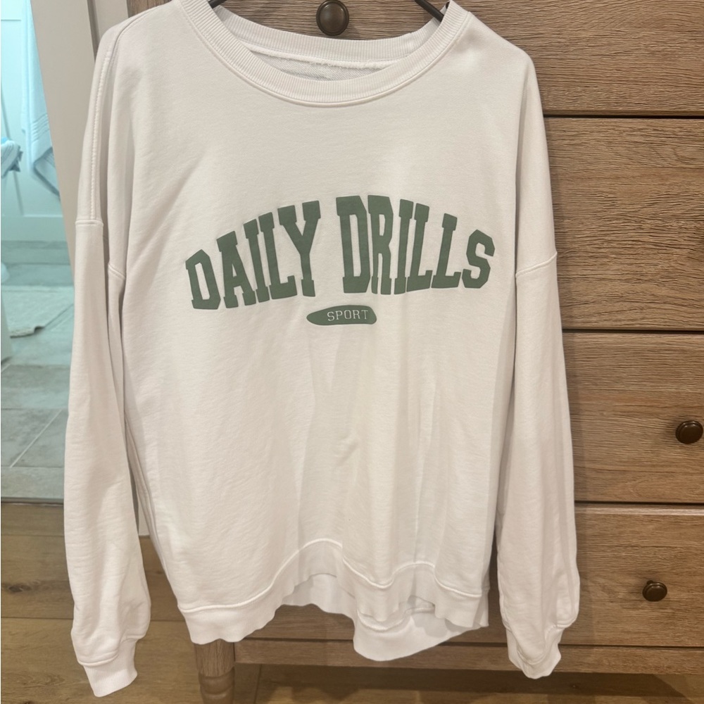 Daily Drills White Sweatshirt with Green Logo